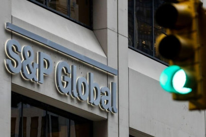 s p global trims back default forecasts
