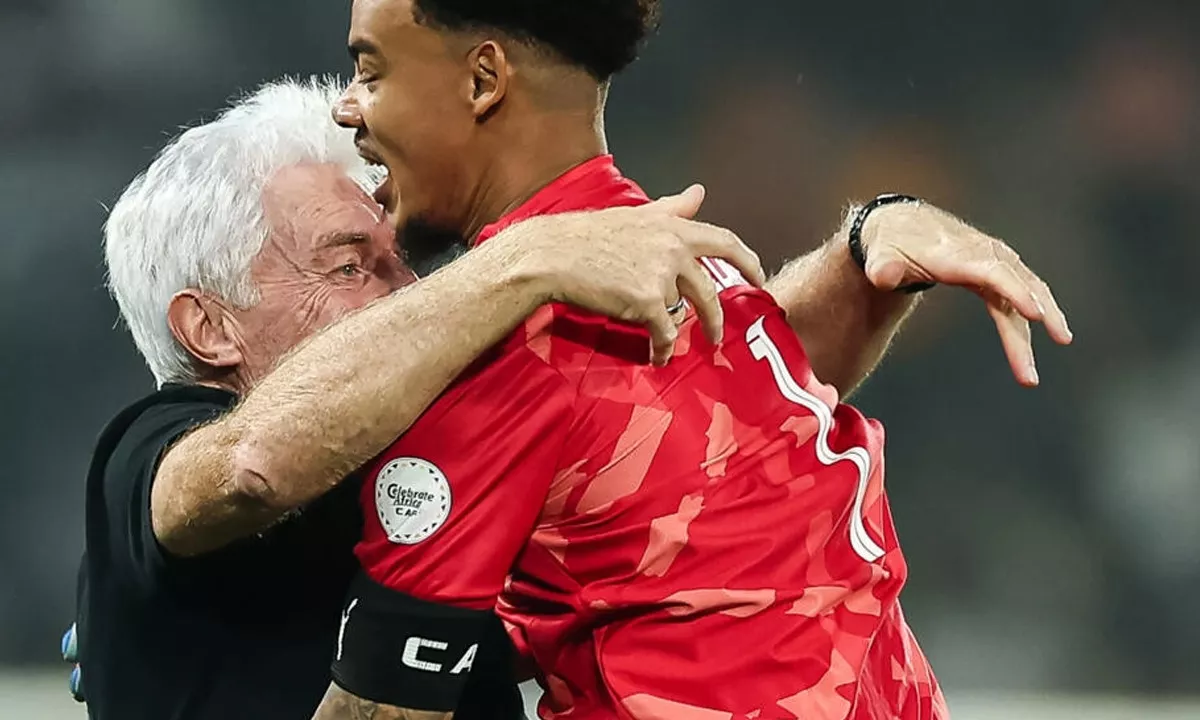 south africa coach hugo broos embraces ronwen williams after the goalkeeper s heroics against cape verde took them through to the africa cup of nations semi finals photo afp south africa coach hugo broos embraces ronwen williams after the goalkeeper s heroics against cape verde took them through to the africa cup of nations semi finals photo afp