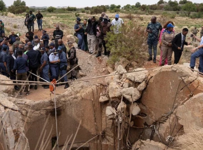 illegal miners battling to survive s africa standoff