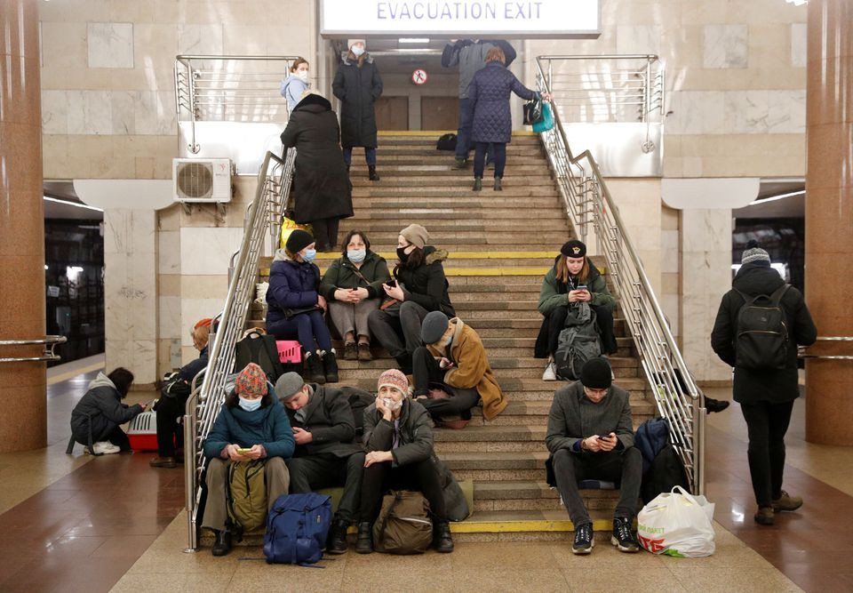 People take shelter in a subway station, after Russian President Vladimir Putin authorized a military operation in eastern Ukraine, in Kyiv, Ukraine February 24, 2022. REUTERS