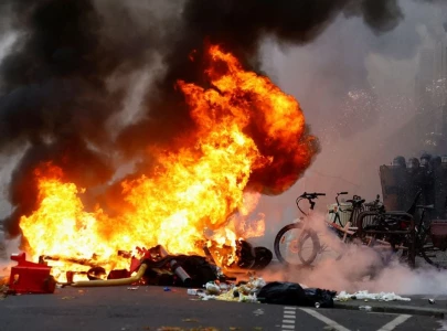 kurdish protest over paris shooting turns violent