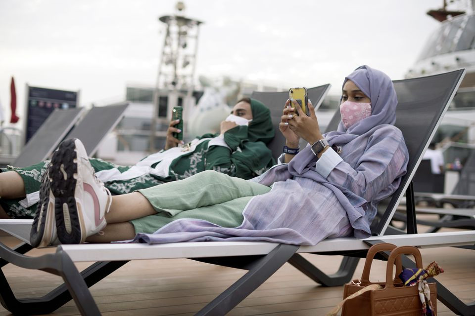 saudi tourists relax on the viewing deck of a cruise ship during their leasure trip to red sea in jeddah saudi arabia september 20 2021 photo reuters