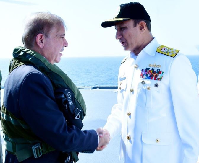 naval chief admiral muhammad amjad khan niazi receiving prime minister muhammad shehbaz sharif onboard pns moawin to witness international fleet review ifr of aman exercise 2023 in the arabian sea on 14 february 2023 photo app