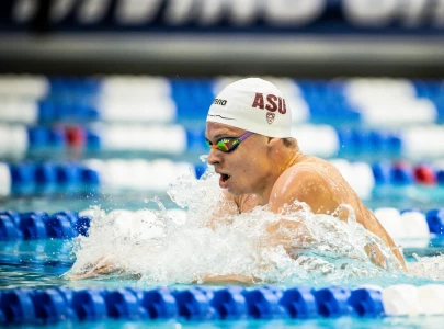 record breaker marchand back in action