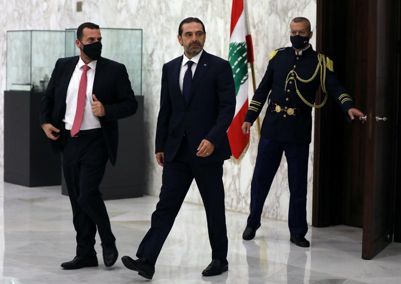 lebanese sunni leader saad al hariri walks after being named lebanon s new prime minister at the presidential palace in baabda lebanon october 22 2020 photo reuters