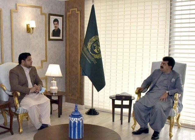 senate chairperson sadiq sanjrani meets with tehreek e kashmir tek united kingdom president raja fahim kayani who called on him in islamabad photo express