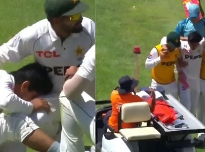 watch saim ayub stretchered off after twisting ankle during sa test watch saim ayub stretchered off after twisting ankle during sa test