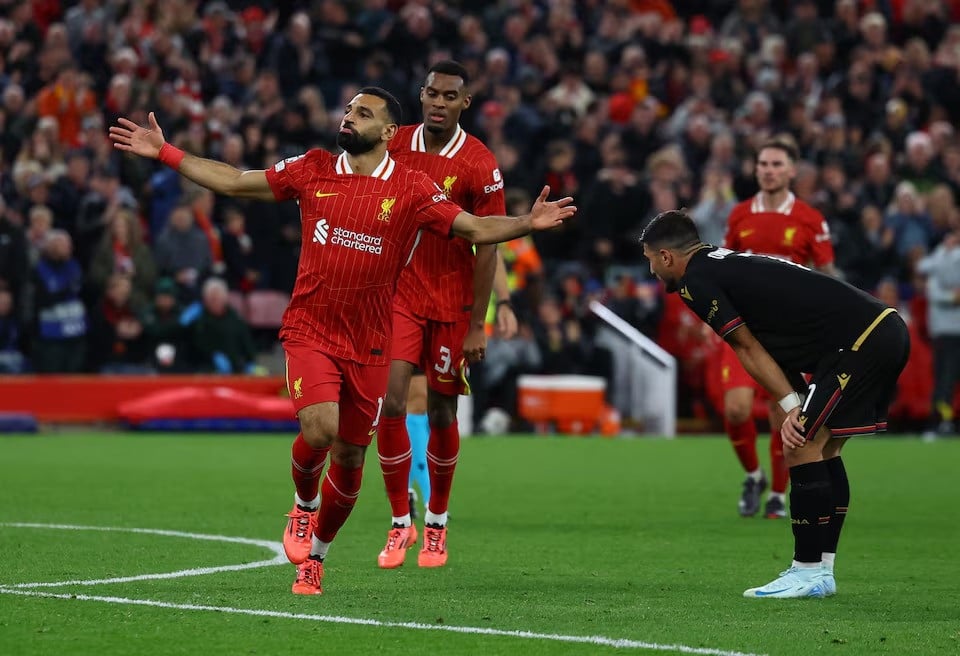 liverpool s mohamed salah celebrates scoring their second goal in the champions league match against bologna at anfield liverpool britain on october 2 2024 photo reuters