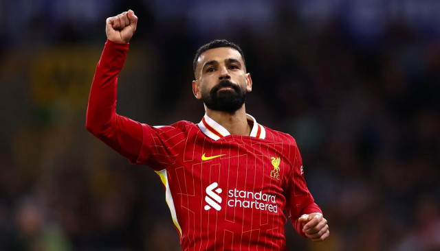 salah hits premier league milestone as liverpool edge past wolves