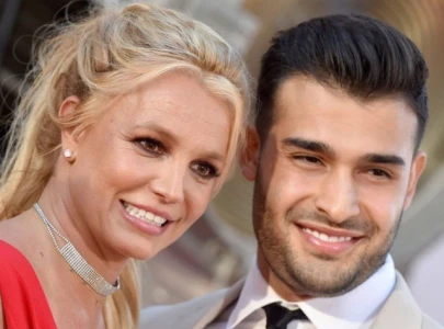 sam asghari prioritizes career and dog over dating after britney spears divorce