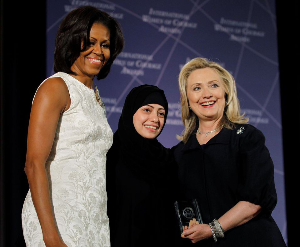 u s secretary of state hillary clinton and first lady michelle obama l congratulate samar badawi of saudi arabia during the state department s 2012 international women of courage award winners ceremony in washington march 8 2012 photo reuters