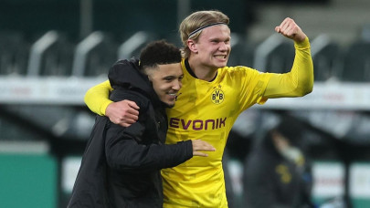 sancho fires dortmund into german cup semi finals