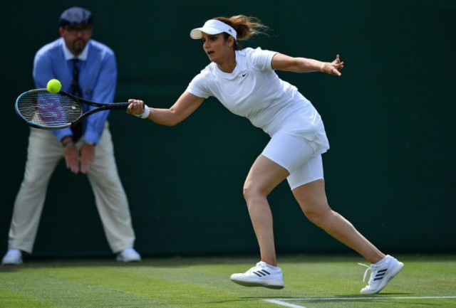 india s sania mirza in action at wimbledon last year photo afp file