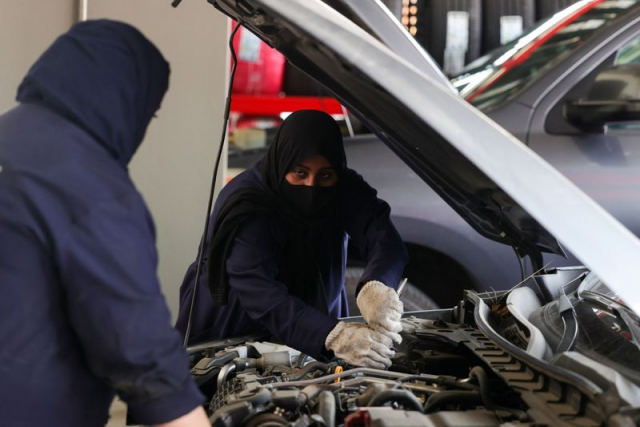 ghada ahmed work on a car at an auto quick service garage in jeddah city photo afp ghada ahmed work on a car at an auto quick service garage in jeddah city photo afp