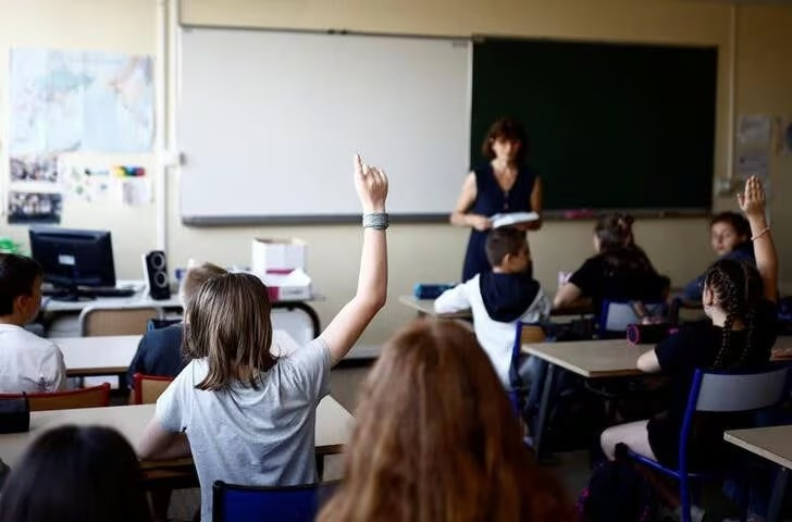 schoolchildren work in a classroom on the first day of the new school year after summer break in savenay france september 4 2023 photo reuters