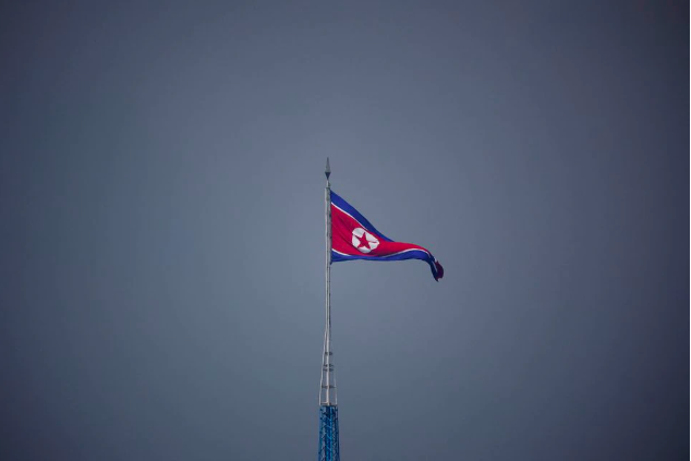 a north korean flag flutters at the propaganda village of gijungdong in north korea in this picture taken near the truce village of panmunjom inside the demilitarized zone dmz separating the two koreas south korea july 19 2022 photo reuters