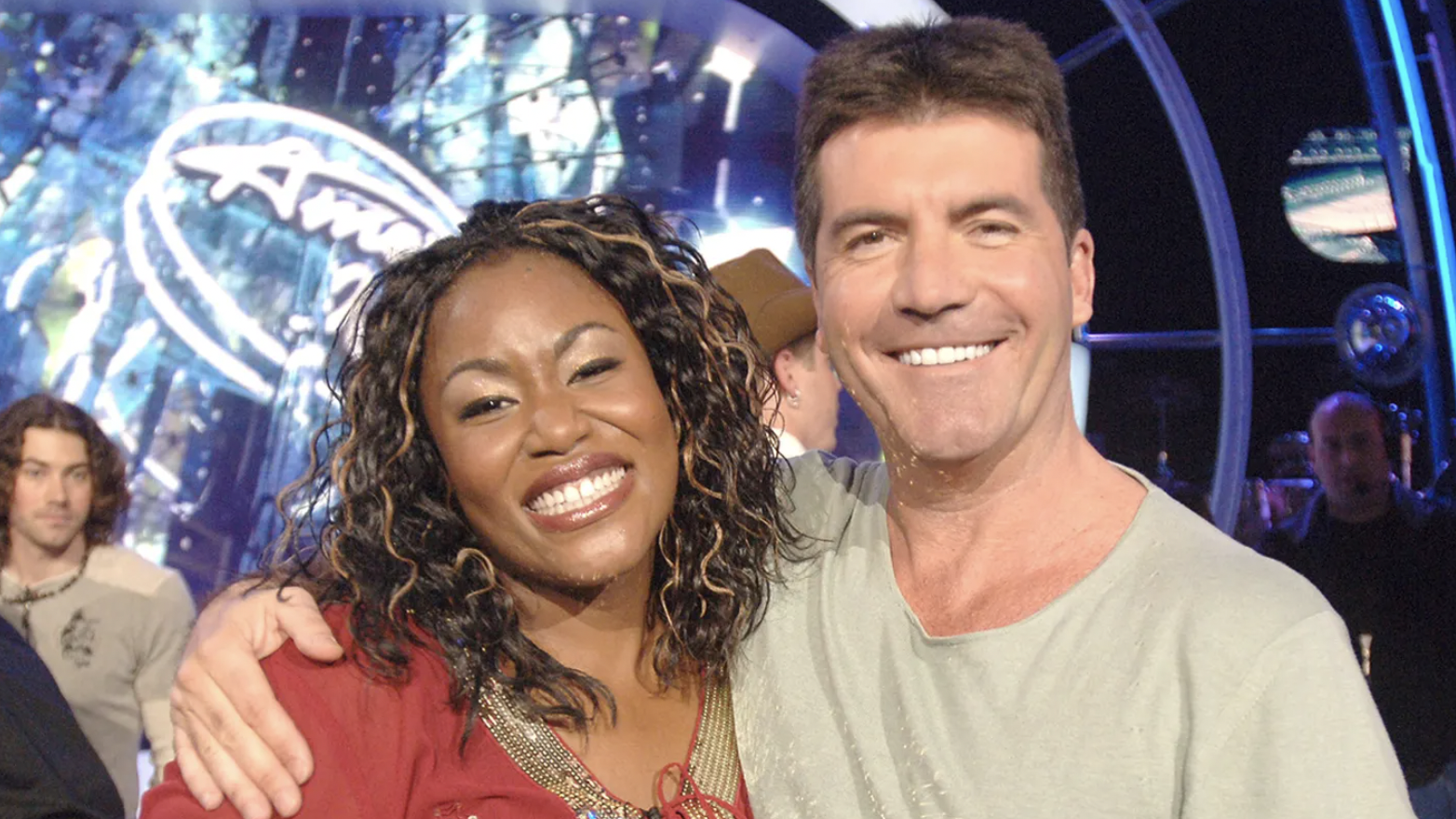 mandisa pictured left on the set of american idol alongside the show s judge simon cowell pictured right image wire image