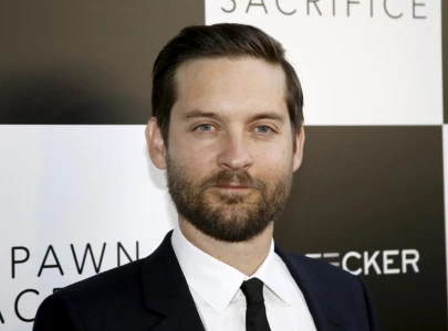 tobey maguire 49 gets cozy with lily chee 20 at michael rubin s fourth of july party tobey maguire 49 gets cozy with lily chee 20 at michael rubin s fourth of july party