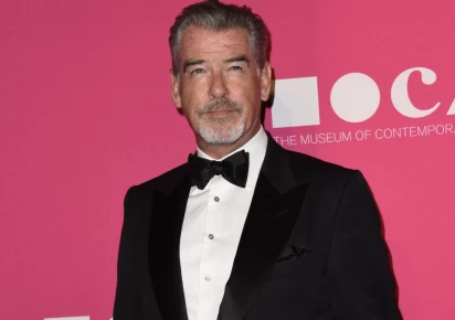 pierce brosnan wife pink dress Whoa, what a radical transformationPierce Brosnan's wife surprised fans  with her weight loss.She shared new shots in a fit-hugging pink  dress.Just have a look at her flawless figureScroll down