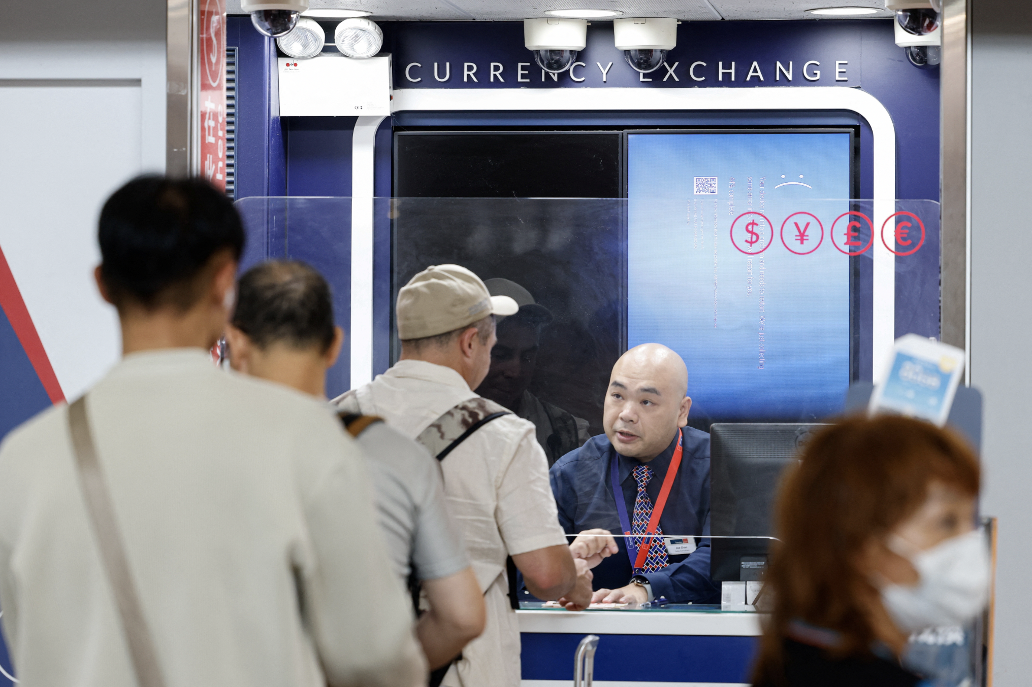 screen showing an error is seen at a currency exchange store at hong kong international airport amid system outages disrupting the operations in hong kong china july 19 2024 photo reuters