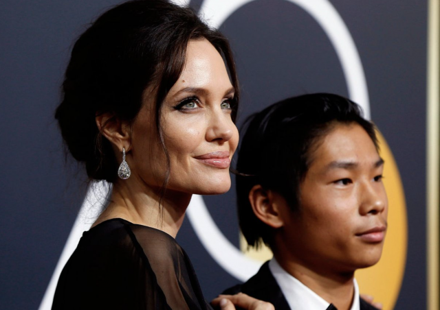 angelina jolie hasn t left son pax s side as he recovers from e bike accident
