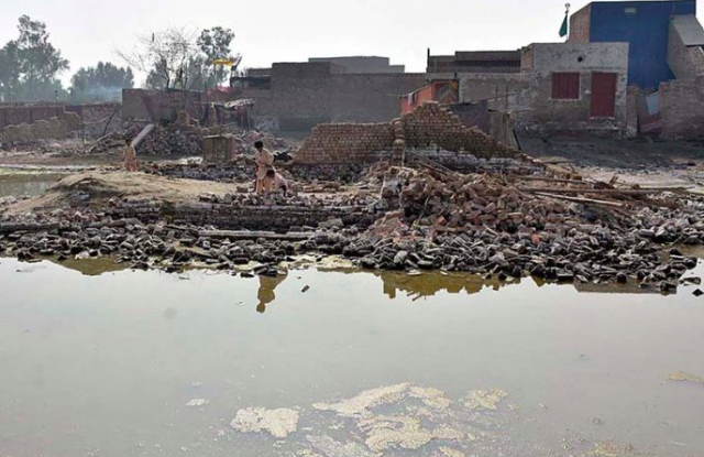 a view of submerged houses after flash flood water as millions of houses and roads damaged and washed away due to deadly flood hit the area of teacher colony photo app a view of submerged houses after flash flood water as millions of houses and roads damaged and washed away due to deadly flood hit the area of teacher colony photo app
