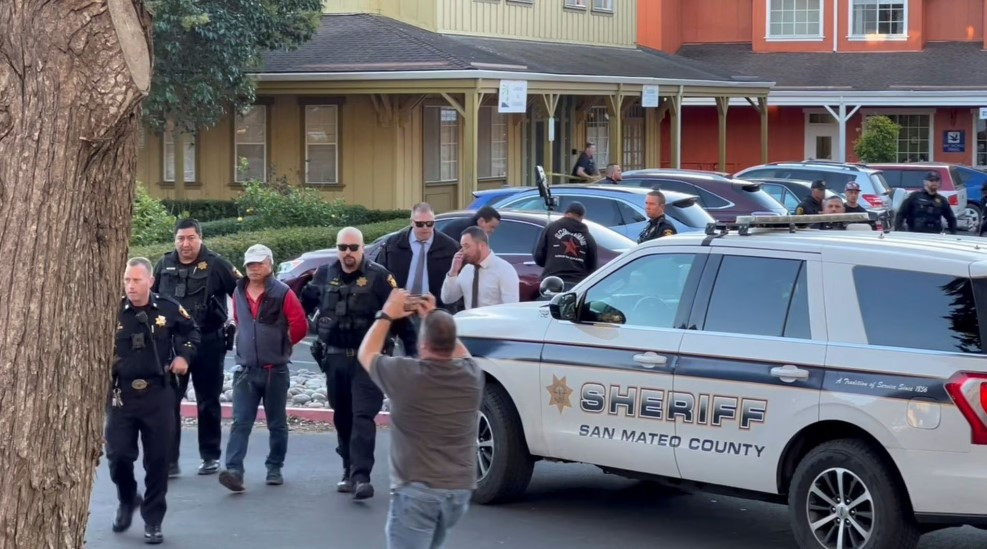 police officers detain a man believed by law enforcement to be the half moon bay mass shooting suspect in half moon bay california u s january 23 2023 in this screengrab taken from a social media video photo reuters