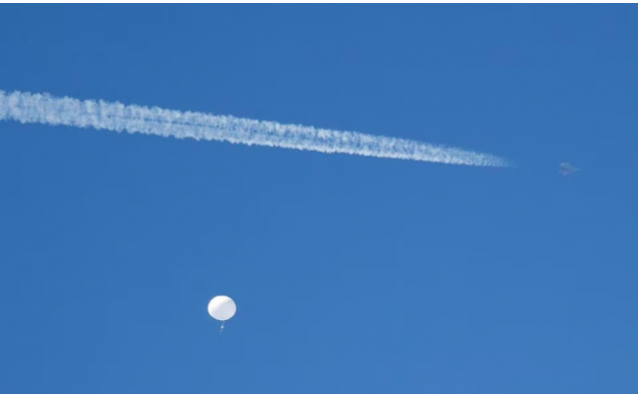 a jet flies by a suspected chinese spy balloon as it floats off the coast in surfside beach south carolina u s february 4 2023 photo reuters randall hill a jet flies by a suspected chinese spy balloon as it floats off the coast in surfside beach south carolina u s february 4 2023 photo reuters randall hill