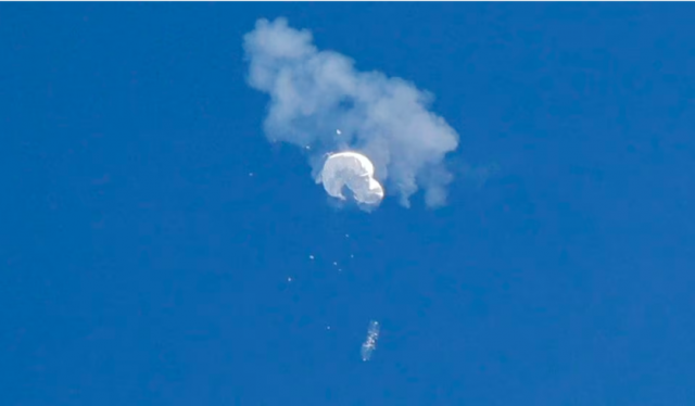 the suspected chinese spy balloon drifts to the ocean after being shot down off the coast in surfside beach south carolina u s february 4 2023 photo reuters randall hill the suspected chinese spy balloon drifts to the ocean after being shot down off the coast in surfside beach south carolina u s february 4 2023 photo reuters randall hill
