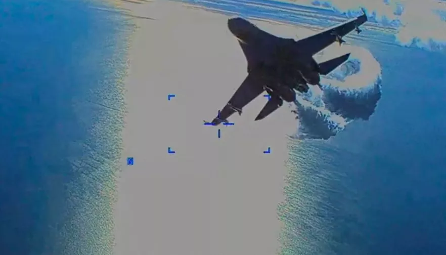 a russian su 27 military aircraft dumps fuel while flying by a u s air force mq 9 reaper drone over the black sea march 14 2023 in this still image taken from handout video released by the pentagon photo courtesy of us european command the pentagon handout via reuters a russian su 27 military aircraft dumps fuel while flying by a u s air force mq 9 reaper drone over the black sea march 14 2023 in this still image taken from handout video released by the pentagon photo courtesy of us european command the pentagon handout via reuters
