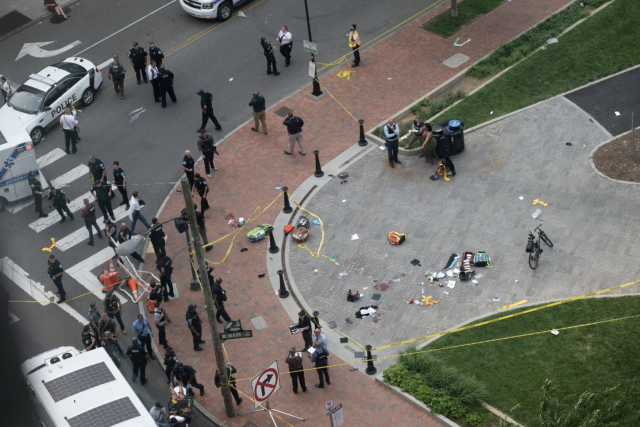 law enforcement officers investigate at the scene after a gunman opened fire in a park as high school graduates and their families emerged from a theater where commencement exercises had just concluded in richmond virginia u s june 6 2023 in this picture obtained from social media clark frierson instagram by esign via reuters law enforcement officers investigate at the scene after a gunman opened fire in a park as high school graduates and their families emerged from a theater where commencement exercises had just concluded in richmond virginia u s june 6 2023 in this picture obtained from social media clark frierson instagram by esign via reuters