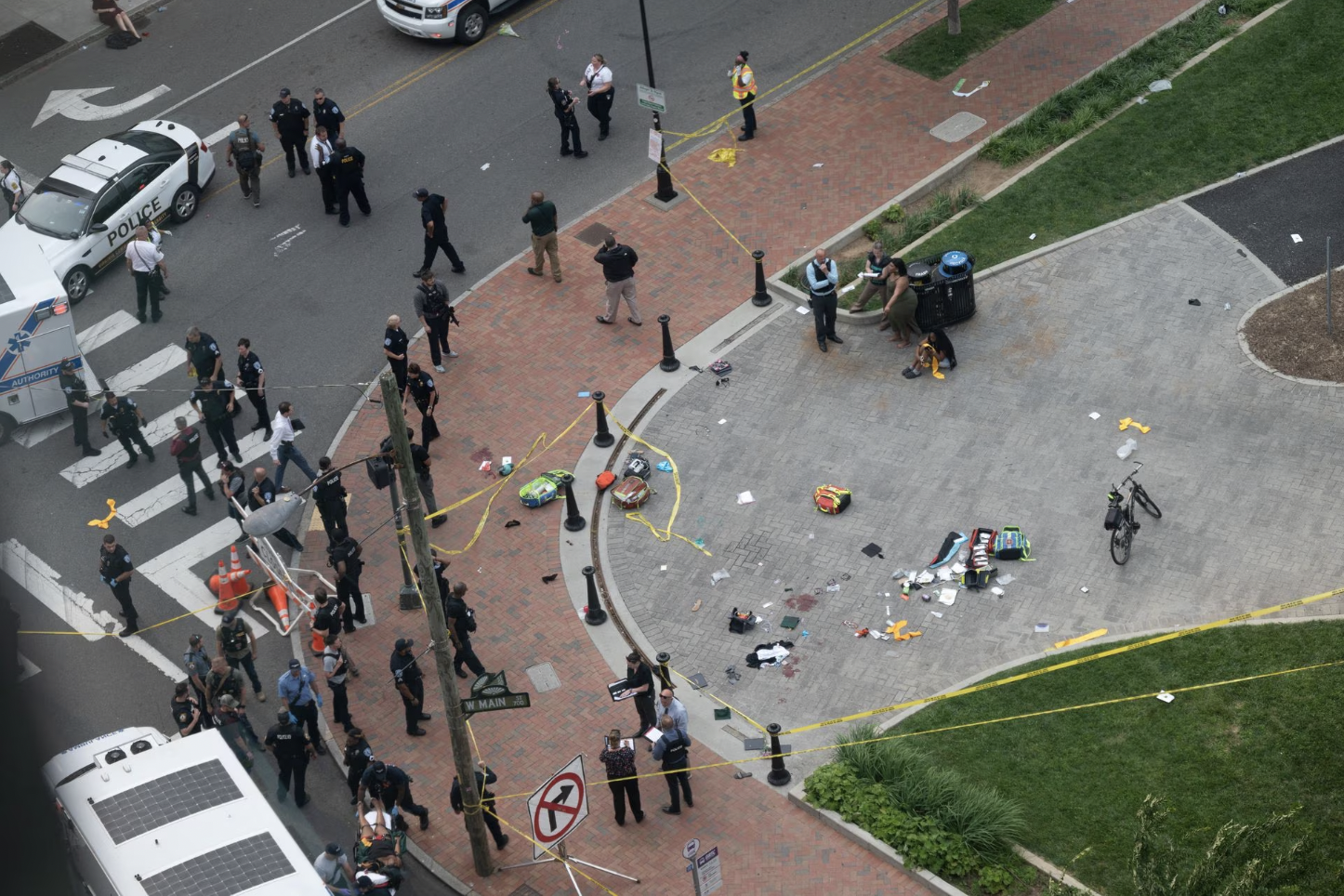 law enforcement officers investigate at the scene after a gunman opened fire in a park as high school graduates and their families emerged from a theater where commencement exercises had just concluded in richmond virginia u s june 6 2023 in this picture obtained from social media clark frierson instagram by esign via reuters