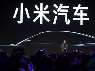 china s xiaomi unveils first electric car plans to become top automaker china s xiaomi unveils first electric car plans to become top automaker