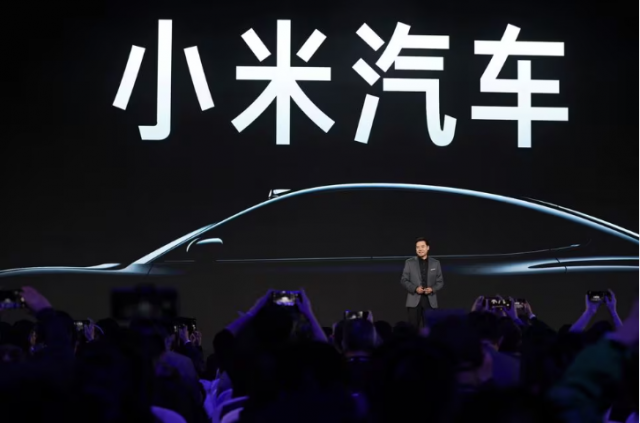 china s xiaomi unveils first electric car plans to become top automaker china s xiaomi unveils first electric car plans to become top automaker