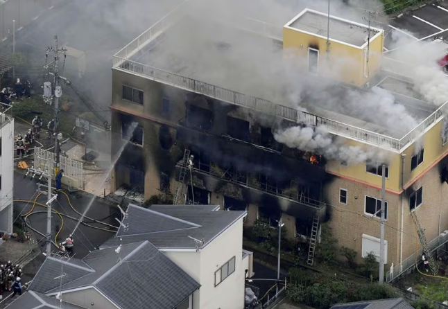 an aerial view shows firefighters battling fires at the site where a man started a fire after spraying a liquid at a three story studio of kyoto animation co in kyoto western japan in this photo taken by kyodo july 18 2019 mandatory credit kyodo via reuters file photo