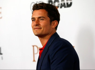 orlando bloom opens up about his regrets playing paris in troy despite film s box office success