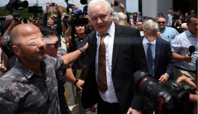 julian assange walks free after guilty plea in us court on pacific island