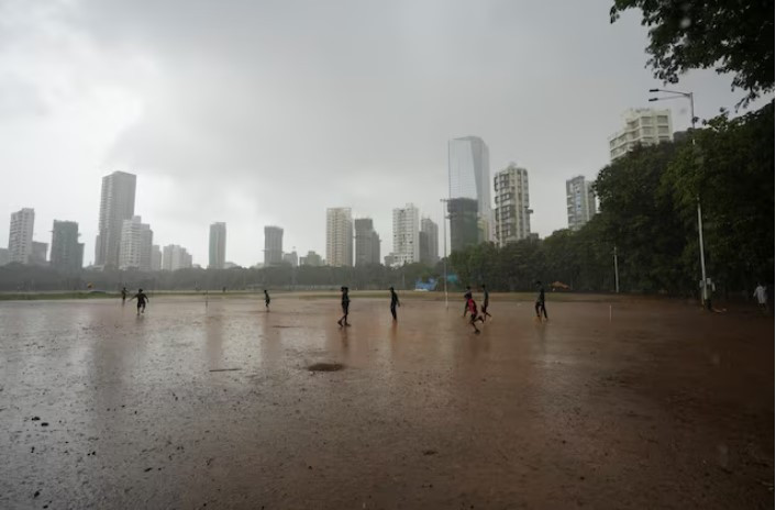 children play in the rain in mumbai india june 20 2024 photo reuters