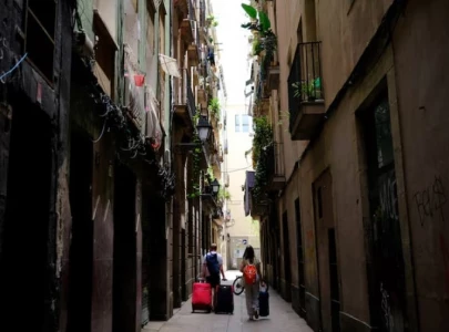 spain targets holiday rentals to tackle housing crisis