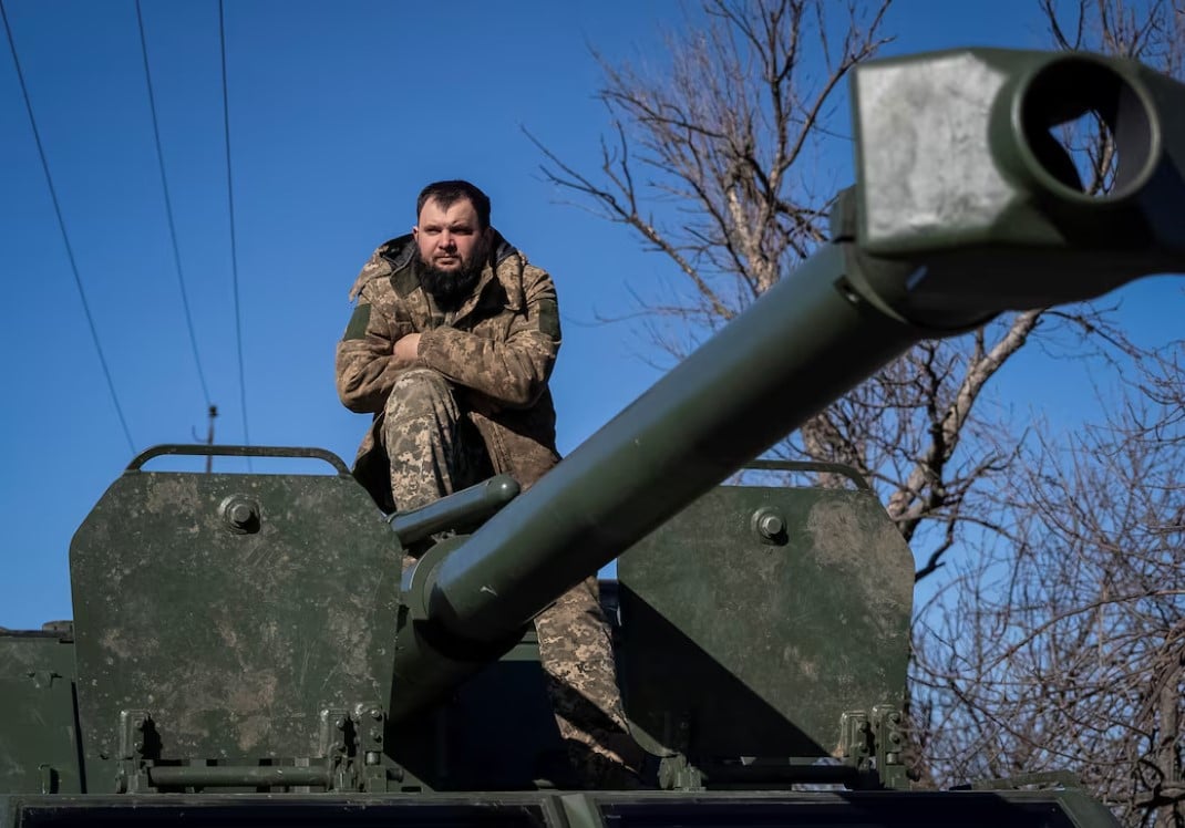 a ukrainian serviceman of 56th separate motorized infantry brigade sits a top of a czech made dana self propelled howitzer amid russia s attack on ukraine near the town of bakhmut in donetsk region ukraine photo reuters