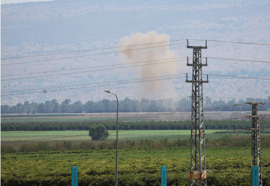 smoke rises above the israeli occupied golan heights photo reuters