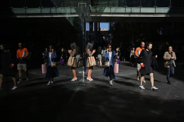 people walk outside a shopping mall in the sydney central business district in sydney australia photo reuters people walk outside a shopping mall in the sydney central business district in sydney australia photo reuters