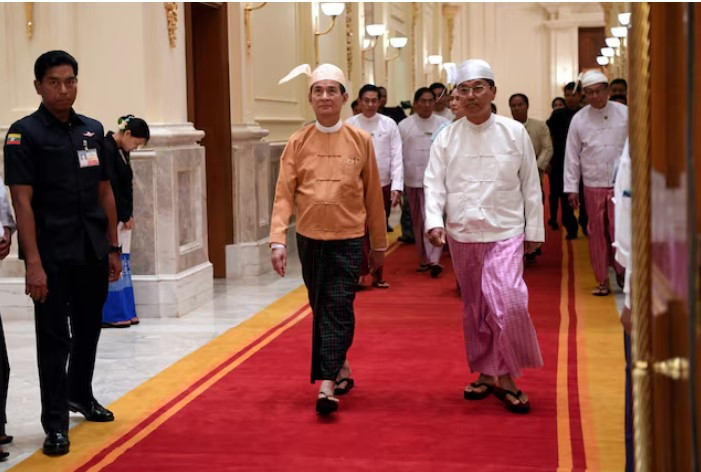 newly elected myanmar president win myint c and vice president myint swe arrive at the presidential palace at naypyitaw myanmar photo reuters