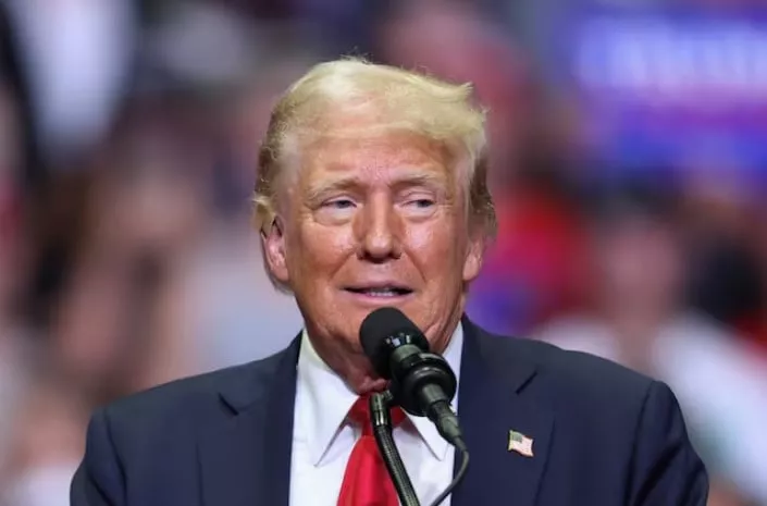 republican presidential nominee and former us president donald trump wears a flesh colored bandage on his ear as he holds a campaign rally for the first time with his running mate republican vice presidential nominee us senator j d vance r oh in grand rapids michigan us photo reuters republican presidential nominee and former us president donald trump wears a flesh colored bandage on his ear as he holds a campaign rally for the first time with his running mate republican vice presidential nominee us senator j d vance r oh in grand rapids michigan us photo reuters