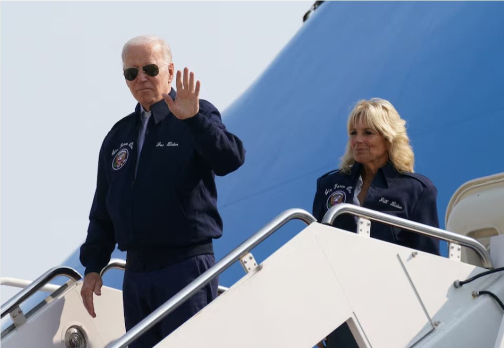 us president joe biden waves as he and first lady jill biden board air force one as they depart for london to attend the funeral of britain s queen elizabeth from joint base andrews in maryland us photo reuters