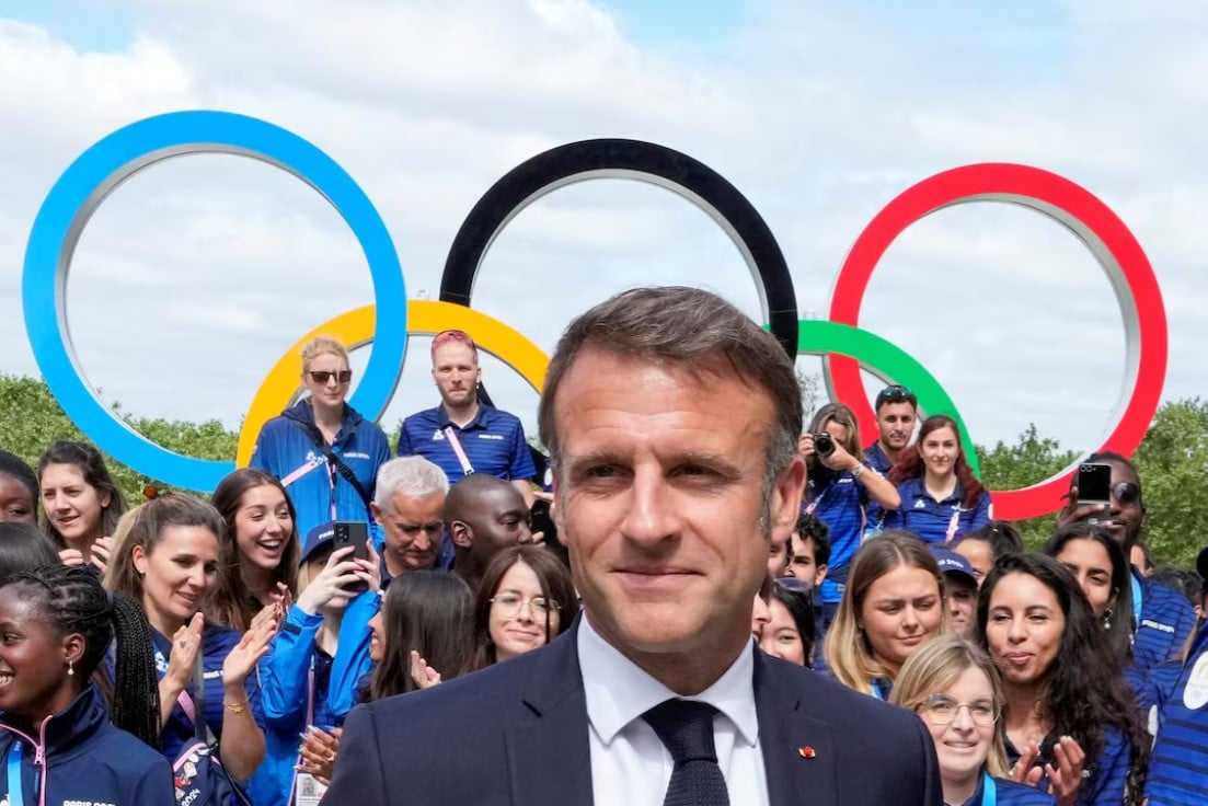 french president emmanuel macron meets with french athletes as he visits the olympic village for the 2024 summer olympics in paris photo reuters