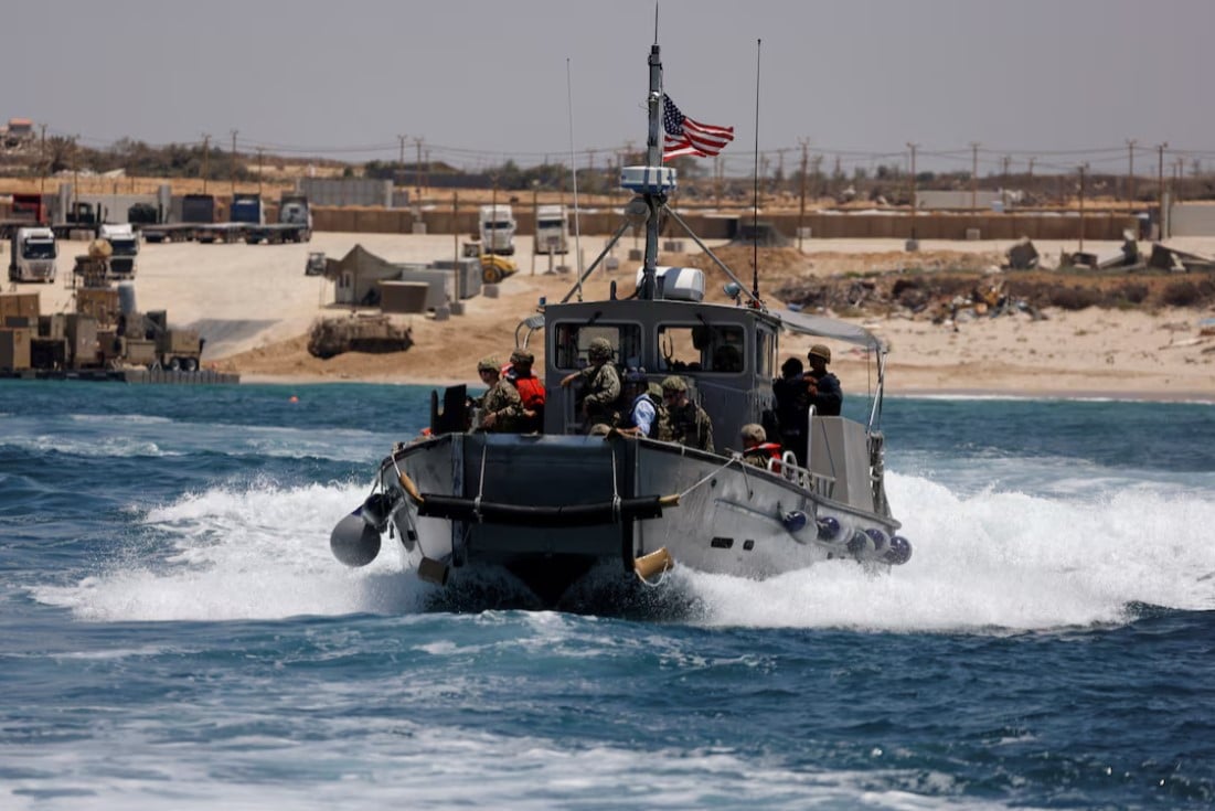 an american boat carrying american soldiers and journalist sails near the trident pier a temporary pier to deliver aid off the gaza strip amid the ongoing conflict between israel and hamas near the gaza coast photo reuters