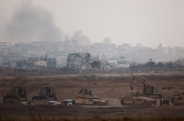 israeli military troops prepare near the israel gaza border amid the conflict between israel and hamas in israel photo reuters israeli military troops prepare near the israel gaza border amid the conflict between israel and hamas in israel photo reuters