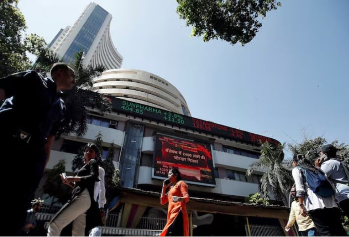 people walk past the bombay stock exchange bse building in mumbai india photo reuters