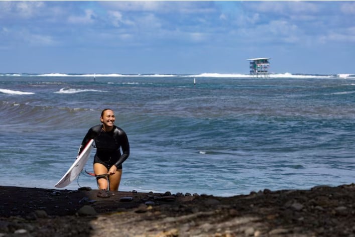 carissa moore five time world champion leaves a beach after surfing near the paris 2024 olympics surfing site in teahupo o tahiti french polynesia photo reuters